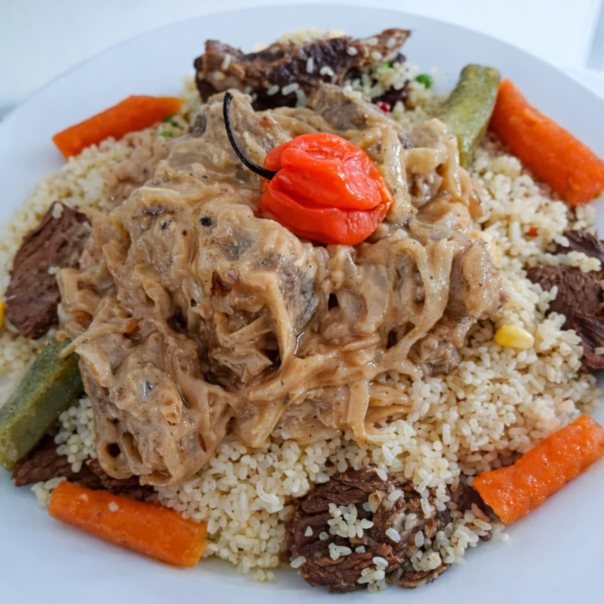 Riz gras à la sauce yassa : recette originale