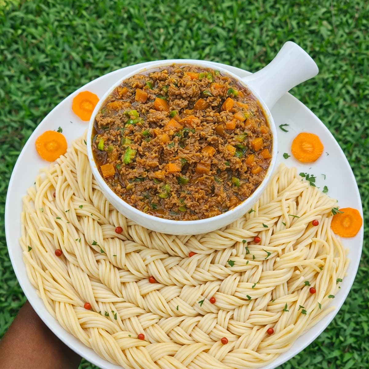 Sauce bolognaise et ses spaghetis coiffés