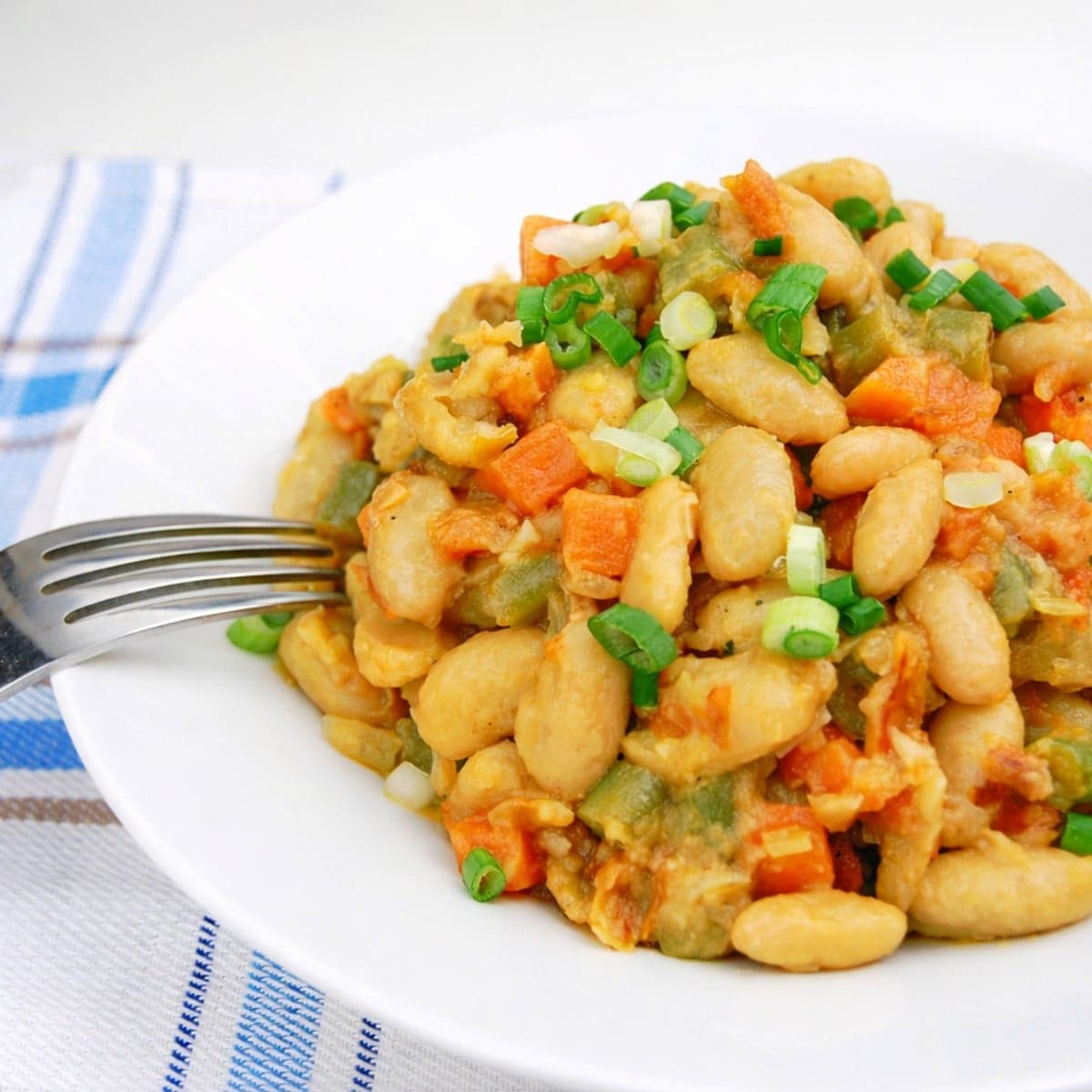 Haricots blancs sautés aux légumes