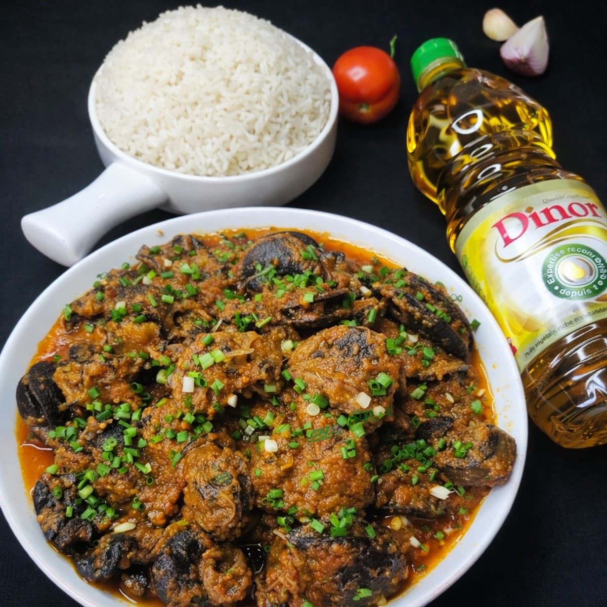 Escargots sautés à la tomate : recette africaine
