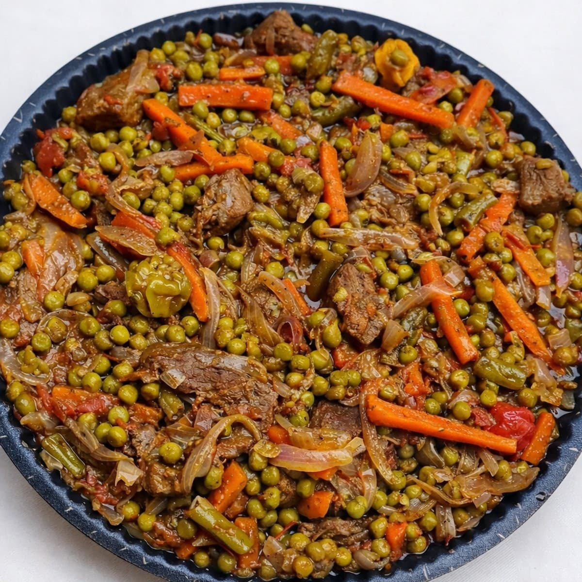 Petits pois mijotés au bœuf : recette épicée maison