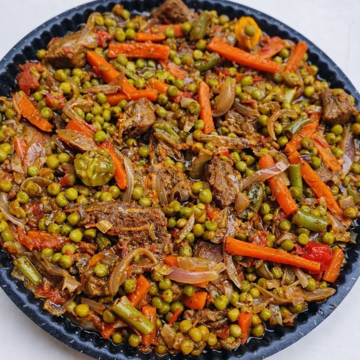 Sauté de bœuf aux petits pois et légumes croquants